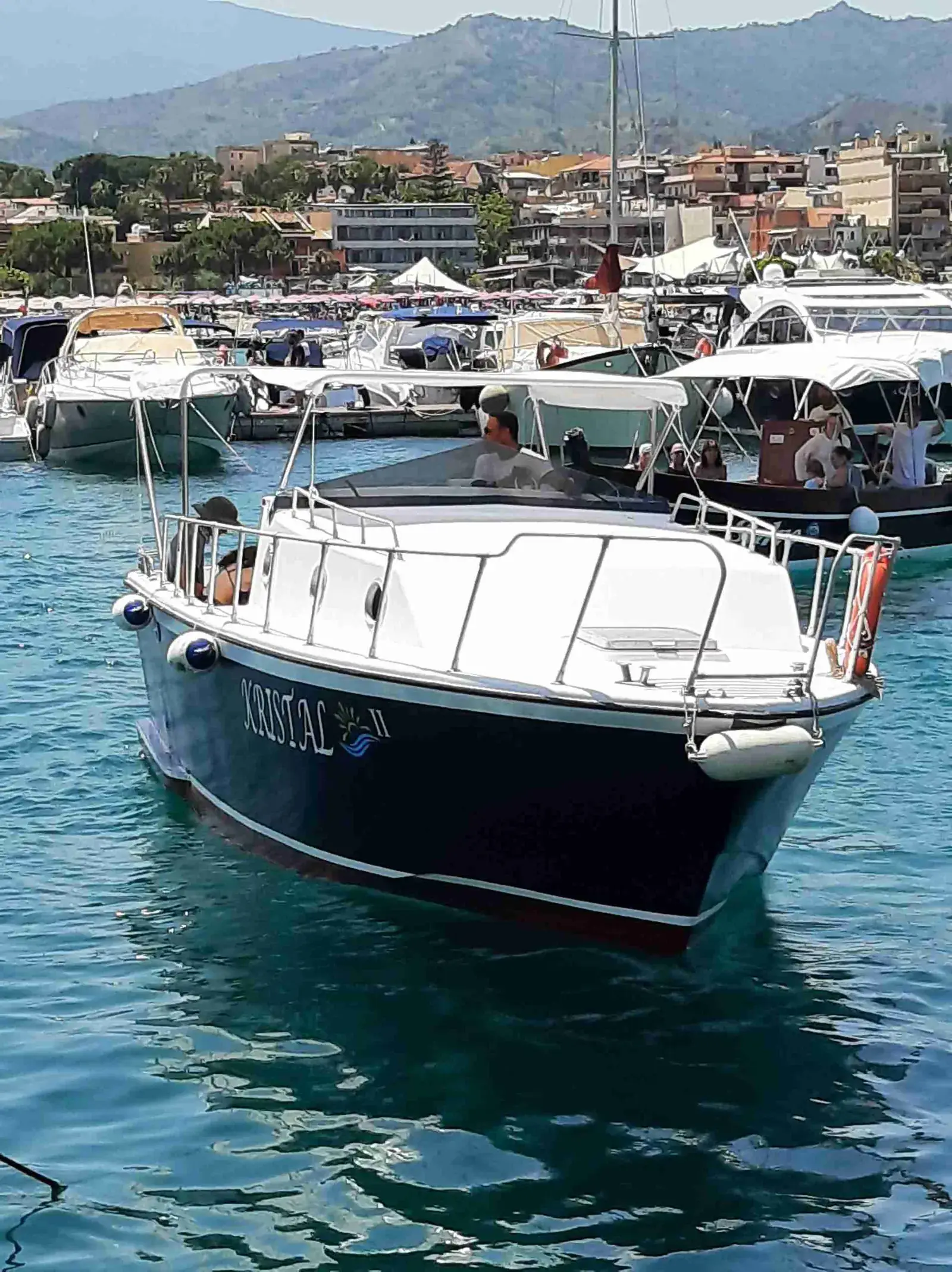 Our boat moored in the harbour of Giardini Naxos