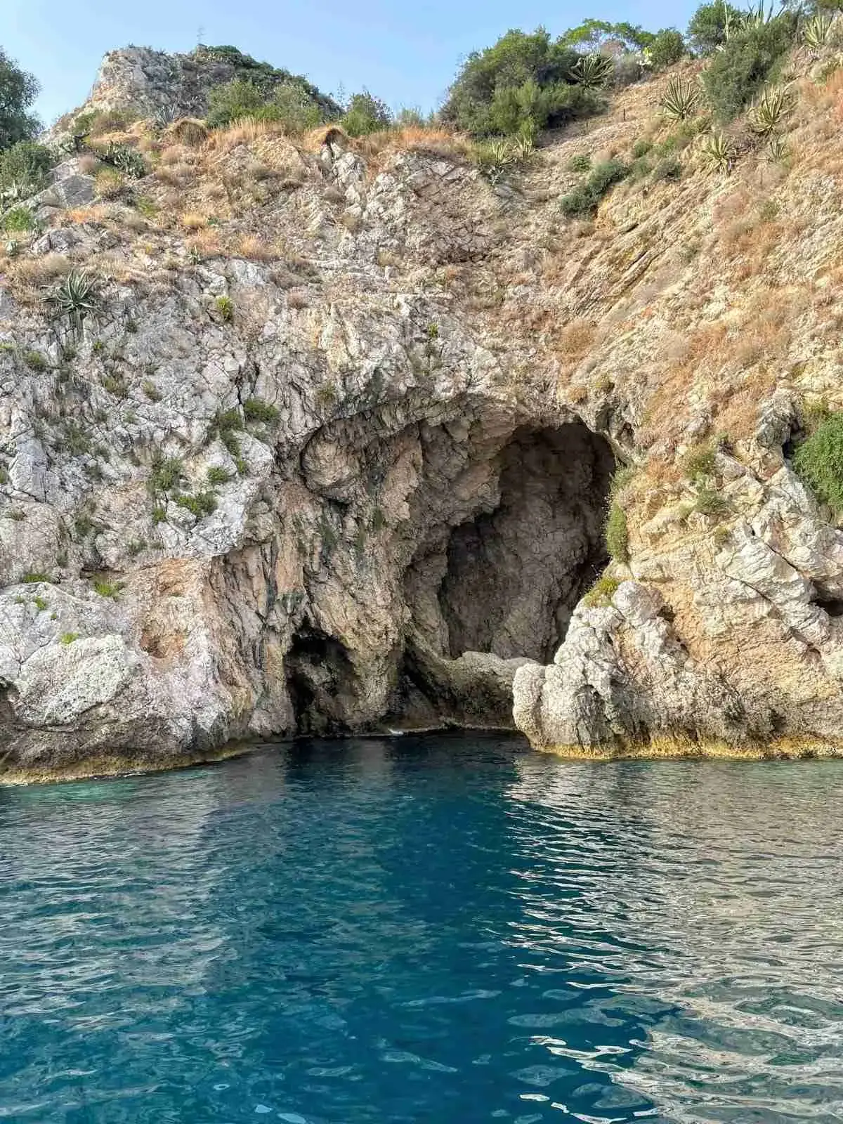 A sea cave in the limestone cliffs of the Taormina coast